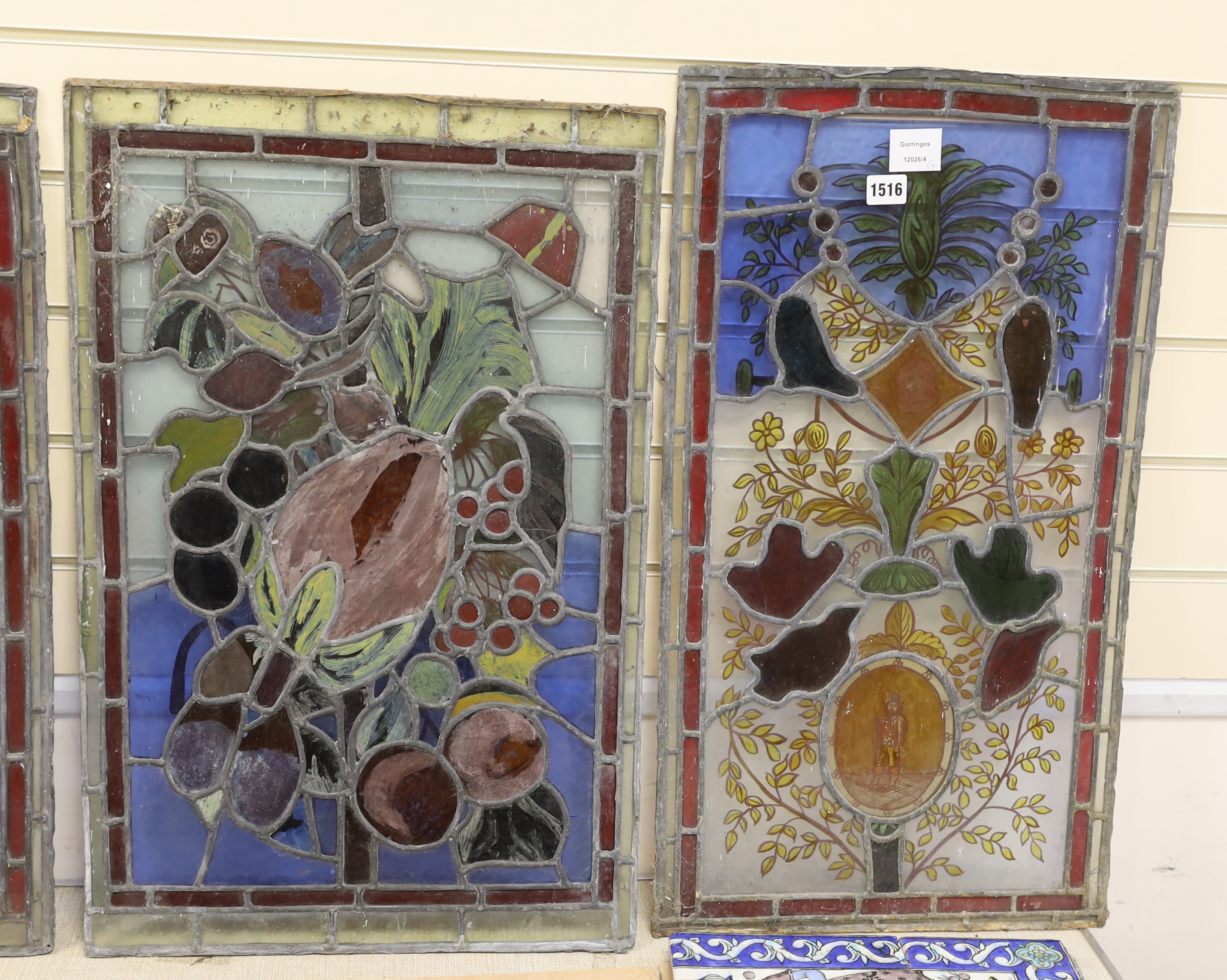 Four Victorian stained glass panels, tallest 70cm high x 39cm wide